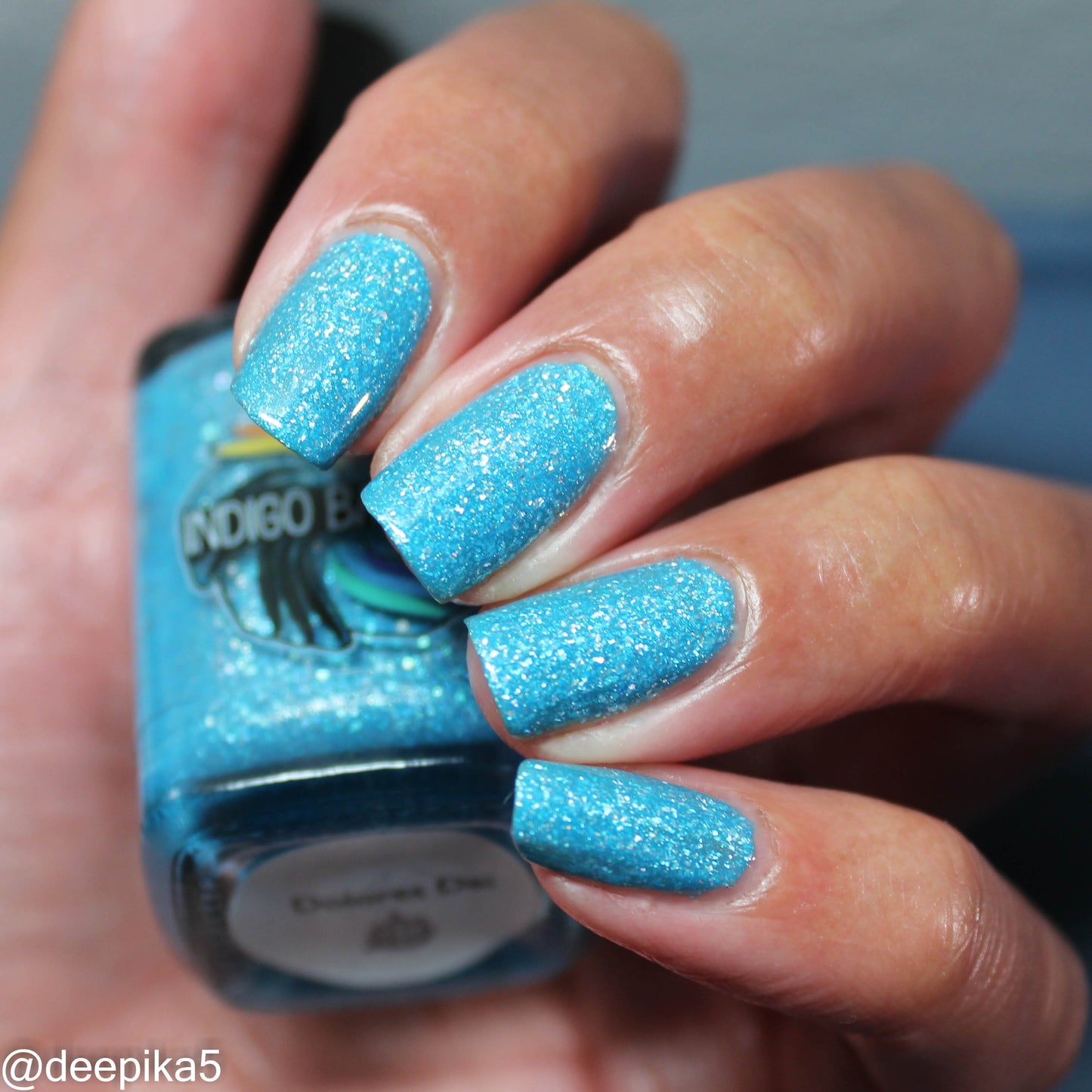 Dolores Dei - sky blue holo flakie