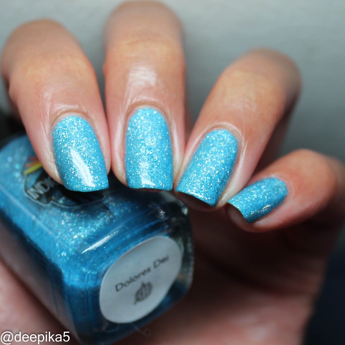 Dolores Dei - sky blue holo flakie