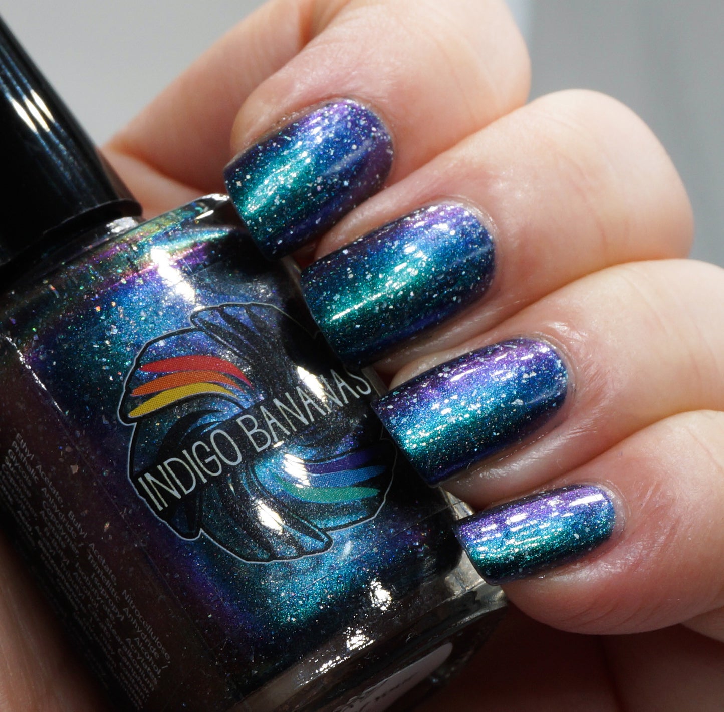 Nature of Your Reality - teal/bright green-blue multichrome linear holographic w/ flakies