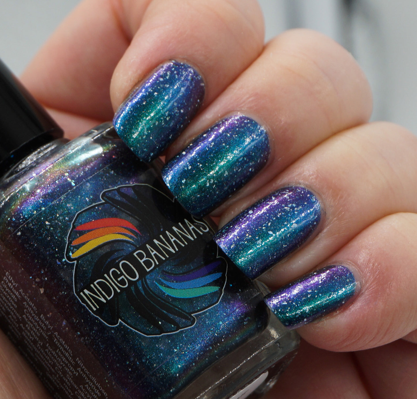 Nature of Your Reality - teal/bright green-blue multichrome linear holographic w/ flakies