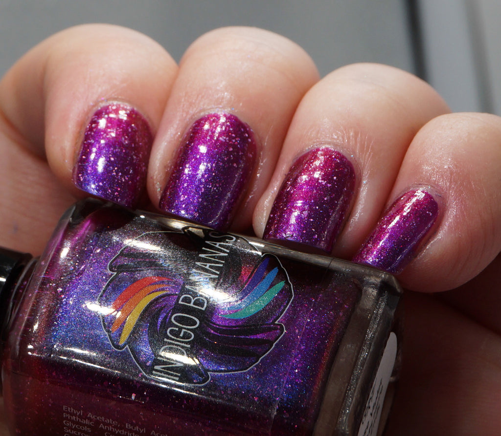 These Violet Delights Have Violet Ends - dark fuchsia multichrome linear holographic w/ flakies