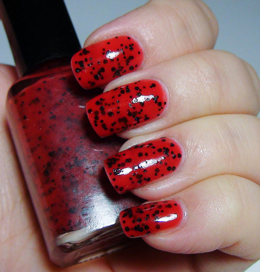 Enchante - red & black jelly - GLOWS blue